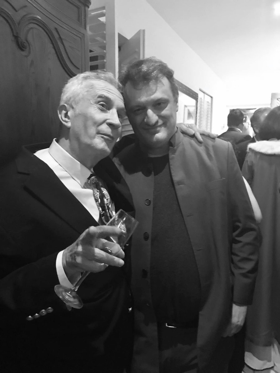 Frank Howson with Richard Wolstencroft at an event, black and white photo